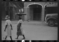 Along one of the main streets in Christiansted, Virgin Islands. Sourced from the Library of Congress.