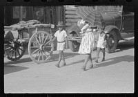 [Untitled photo, possibly related to: Along one of the shopping streets on a Saturday afternoon in Christiansted, St. Croix, Virgin Islands]. Sourced from the Library of Congress.