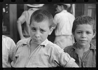 [Untitled photo, possibly related to: Children who were begging for pennies in the market in Rio Piedras, Puerto Rico]. Sourced from the Library of Congress.