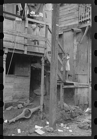 Houses in the slum area of the town of Lares, Puerto Rico. Sourced from the Library of Congress.