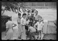 San Juan, Puerto Rico. People carrying water home because of the failure of the water system in San Juan for three days. Sourced from the Library of Congress.