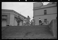 [Untitled photo, possibly related to: San Juan, Puerto Rico. People carrying water home because of the failure of the water system in San Juan for three days]. Sourced from the Library of Congress.
