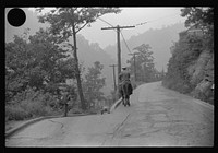 [Untitled photo, possibly related to: Old miner on donkey, still quite a common means of transportation, in county road near Mohegan, West Virginia]. Sourced from the Library of Congress.