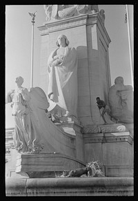 [Untitled photo, possibly related to: Colored boys playing on Columbus Monument. Washington, D.C.]. Sourced from the Library of Congress.