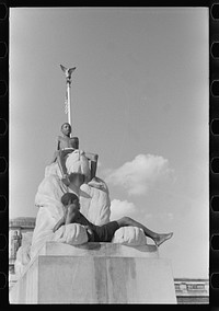 [Untitled photo, possibly related to: Colored boys playing on Columbus Monument. Washington, D.C.]. Sourced from the Library of Congress.