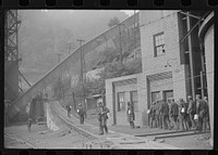 Miners turning in lamps and starting home. Caples, West Virginia. Sourced from the Library of Congress.