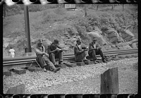 "Settin' around." Mining town, Davey, West Virginia. Sourced from the Library of Congress.