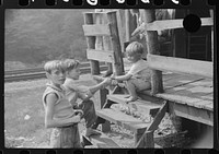 [Untitled photo, possibly related to: Mother, wife and child of unemployed coal miner, Marine, West Virginia]. Sourced from the Library of Congress.