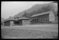 Community building and company store in abandoned mining town, Twin Branch, West Virginia. Sourced from the Library of Congress.