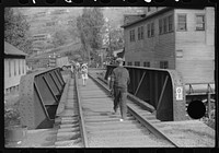 [Untitled photo, possibly related to: Coal miners going home from work. Omar, West Virginia]. Sourced from the Library of Congress.