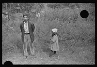 [Untitled photo, possibly related to: Mexican miner and child, Bertha Hill, West Virginia. Many Mexicans and es were brought into Scotts Run around 1926 to break the strike. Now about one fourth of all mines employ any at all and these, only very small percent and "only the cream." They are generally accepted by other folks and there is a good deal of mixing and intermarrying]. Sourced from the Library of Congress.