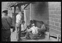 [Untitled photo, possibly related to: Card gambling in center of town, Osage, West Virginia]. Sourced from the Library of Congress.