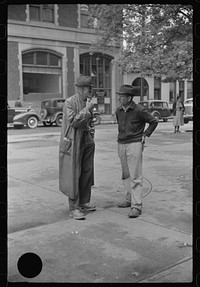 [Untitled photo, possibly related to: A rainy Saturday afternoon, courthouse square, Morgantown, West Virginia]. Sourced from the Library of Congress.