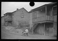 [Untitled photo, possibly related to: Coal miners' children playing in front of their homes, Chaplin, West Virginia]. Sourced from the Library of Congress.