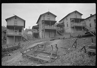 Front yard, company houses, coal mining section, Purseglove, Scotts Run, West Virginia. Sourced from the Library of Congress.