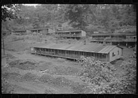 [Untitled photo, possibly related to: Coal miners' homes, company houses, with piles of slag and slate. "The Patch," Cassville, West Virginia]. Sourced from the Library of Congress.