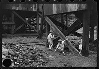 [Untitled photo, possibly related to: Children's favorite playground, around coal mine tipples. Pursglove, Scotts Run, West Virginia]. Sourced from the Library of Congress.