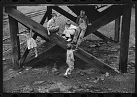 Children's favorite playground, around coal mine tipples. Pursglove, Scotts Run, West Virginia by Marion Post Wolcott