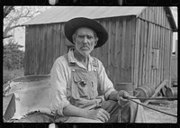 Lee Betties, rural rehabilitation client, with sack of horse and mule feed on rear of his wagon, leaving general store at Woodville, Greene County, Georgia. Sourced from the Library of Congress.