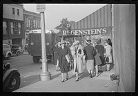 [Untitled photo, possibly related to: Salesgirl leaving work, Atlanta, Georgia]. Sourced from the Library of Congress.
