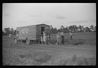 [Untitled photo, possibly related to: Rolling store which goes from door to door selling groceries, hardware, drygoods, drugs, and a variety of household and farm supplies. Near Montezuma, Georgia]. Sourced from the Library of Congress.