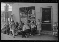 [Untitled photo, possibly related to: Playing cards outside service station, Saturday afternoon, Greensboro, Greene County, Georgia]. Sourced from the Library of Congress.
