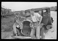 Migrant laborer's family near Canal Point packinghouse, Florida. Sourced from the Library of Congress.