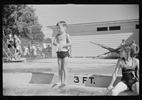 Getting ready to dive into the pool at Greenbelt, Maryland. Sourced from the Library of Congress.