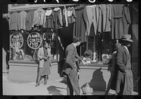 [Untitled photo, possibly related to: Secondhand clothing stores and pawn shops on Beale Street, Memphis, Tennessee]. Sourced from the Library of Congress.