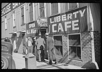 Most tobacco warehouses have the cafe open all day and night under the warehouse. Durham, North Carolina. Sourced from the Library of Congress.