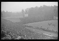 [Untitled photo, possibly related to: Spectators at the Duke University-North Carolina football game. Durham, North Carolina]. Sourced from the Library of Congress.