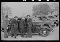[Untitled photo, possibly related to: Cars parked outside the stadium at the Duke University-North Carolina football game. Durham, North Carolina]. Sourced from the Library of Congress.