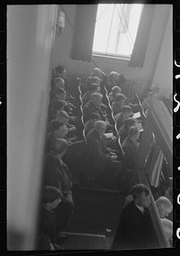 [Untitled photo, possibly related to: Townspeople listening to discussion and balloting during town meeting.  Woodstock, Vermont]. Sourced from the Library of Congress.