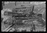 [Untitled photo, possibly related to: Hauling timber by tractor to the road where it is taken by truck to the mill. Near Barnard, Windsor County, Vermont]. Sourced from the Library of Congress.