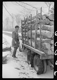 [Untitled photo, possibly related to: Lumberman hauling logs to the mill in truck, near Littleton, New Hampshire]. Sourced from the Library of Congress.