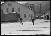 [Untitled photo, possibly related to: Workers coming out of paper mill in Lincoln, New Hampshire]. Sourced from the Library of Congress.