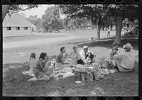 [Untitled photo, possibly related to: People at the Shelby County Horse Show and Fair eating a picnic lunch, Shelbyville, Kentucky]. Sourced from the Library of Congress.