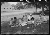[Untitled photo, possibly related to: People at the Shelby County Horse Show and Fair eating a picnic lunch, Shelbyville, Kentucky]. Sourced from the Library of Congress.
