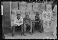 [Untitled photo, possibly related to: Farmers in front of store on Saturday afternoon in Cave City [actually Horse Cave], Kentucky]. Sourced from the Library of Congress.
