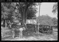 [Untitled photo, possibly related to: Cooking fried supper for a benefit picnic supper on the grounds of St. Thomas' Church. Near Bardstown, Kentucky]. Sourced from the Library of Congress.