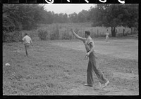 Pitching horseshoes at American Legion fish fry, Oldham County, Post 39, near Louisville, Kentucky. Sourced from the Library of Congress.