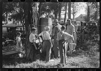 [Untitled photo, possibly related to: Children getting a drink of water at church picnic at St. Thomas Church, near Bardstown, Kentucky]. Sourced from the Library of Congress.