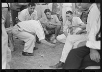 Shooting craps at American Legion fish fry, Oldham County, Post 39, near Louisville, Kentucky. Sourced from the Library of Congress.