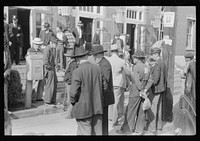 [Untitled photo, possibly related to: Farmers and townspeople in front of federal building on court day, Jackson, Kentucky]. Sourced from the Library of Congress.