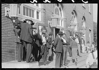 [Untitled photo, possibly related to: Farmers and townspeople in front of federal building on court day, Jackson, Kentucky]. Sourced from the Library of Congress.