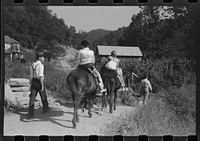 [Untitled photo, possibly related to: Relatives and friends of the family of the deceased going home from a memorial meeting in the mountains near Jackson, Kentucky. See general caption no. 1]. Sourced from the Library of Congress.