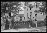 [Untitled photo, possibly related to: Farmers hanging around courthouse on court day during lunch hour. Campton, Kentucky]. Sourced from the Library of Congress.