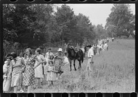 [Untitled photo, possibly related to: Relatives and friends of the family of the deceased going home from a memeorial meeting in the mountains near Jackson, Kentucky. See general caption no. 1]. Sourced from the Library of Congress.