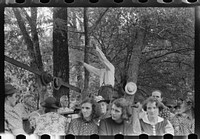 [Untitled photo, possibly related to: Preacher, relatives and friends of the deceased at a memorial meeting near Jackson, Breathitt County, Kentucky. See general caption no. 1]. Sourced from the Library of Congress.
