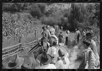 [Untitled photo, possibly related to: Relatives and friends of the family of the deceased going home from a memeorial meeting in the mountains near Jackson, Kentucky. See general caption no. 1]. Sourced from the Library of Congress.